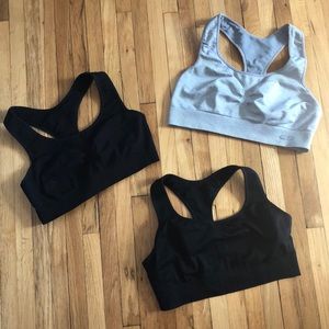 Three Champion Sports Bras-size large